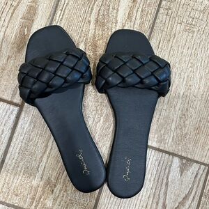 Black braided sandals